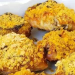 Sobrecoxa de frango com laranja, mostarda e melado